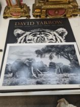 David Yarrow, a photographic print of two elephants and a copy of his book with inscription to front