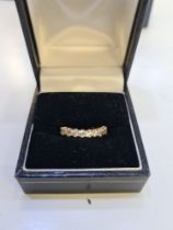 9ct yellow gold half eternity ring, marked 375, set with cubic zirconia, size K, approx 1.36g
