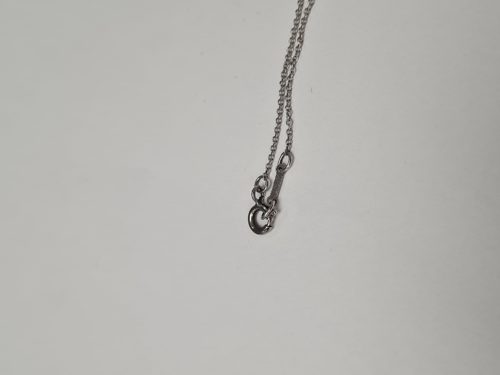 Tiffany & Co; A Sterling Sivler neckchain hung with Elsa Peretti small silver cross? - Image 6 of 6