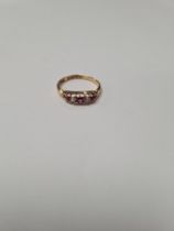 18ct yellow gold ring, set alternating round cut rubies and diamond, size N, marked 18, Birmingham m