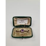 Very pretty antique 9ct gold bar brooch with central round cut amethyst surrounded seed pearls, flan