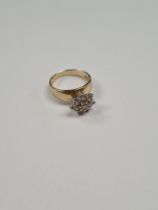 14K yellow gold band ring with high mounted diamond daisy head cluster, comprising 8 approx 0.15 car