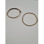 Two 9ct yellow gold bangles, both AF, one unmarked, hinged example marked 375, approx 9.4g