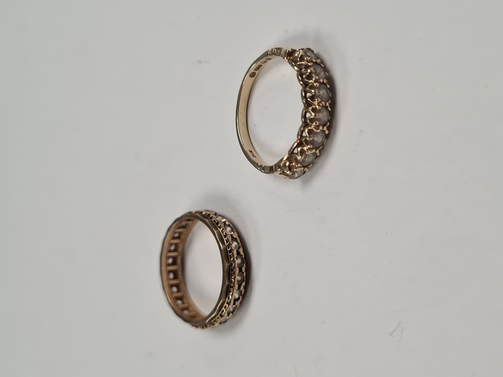 9ct yellow gold eternity ring set with cubic zirconia, marked 375, size P, and a 9ct yellow gold hal