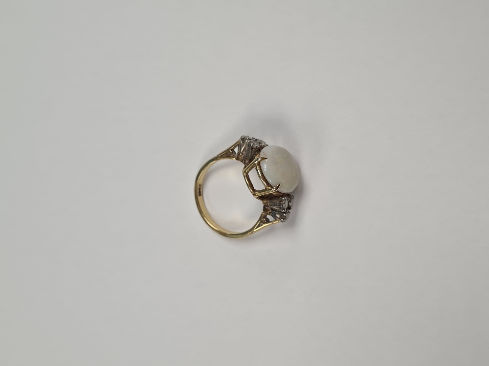 18ct yellow gold dress ring with large central white opal, each side supported 3 round cut claw moun - Image 4 of 5