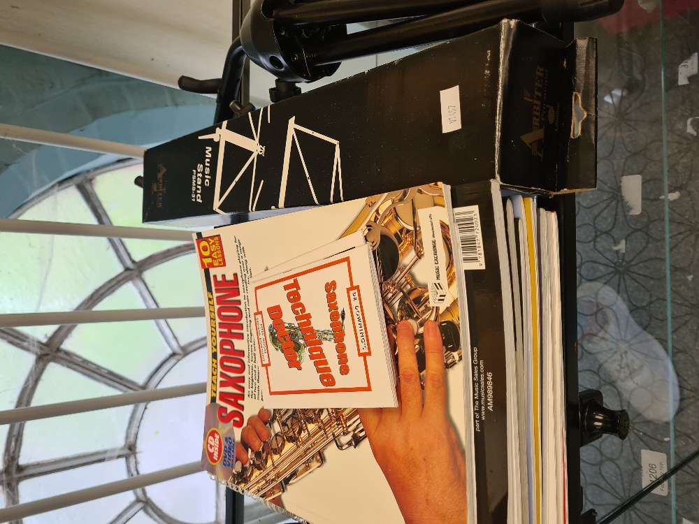 A Yamaha Saxophone in fitted case with related books and music stand - Image 5 of 5