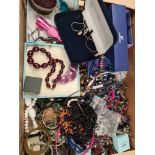 A large quantity of vintage and modern costume jewellery to include hardstone necklaces, etc and a s