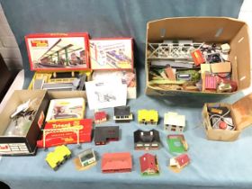 A collection of OO gauge model railway buildings and accessories including mainly Tri-ang Hornby