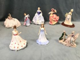 A collection of porcelain figurines - three Royal Doulton Pretty Ladies titled Susan, Amy and