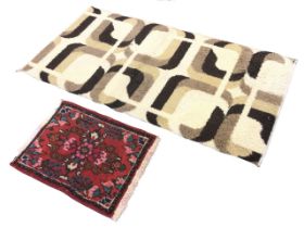 An contemporary oriental wool prayer mat, with floral designs around a central medallion - 15.75in x