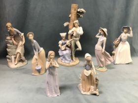 A collection of Spanish porcelain figures by Nao, Lladro, Zaphir, Porcegama, etc., - medieval