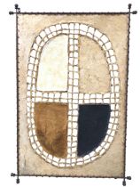 An African fibre and cotton wall piece, the oval central medallion with four segments within open