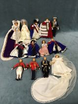 A collection of Peggy Nisbet royal dolls, including Queen Elizabeth II, Princess Anne, Prince