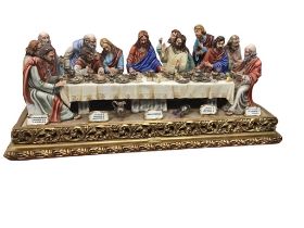 A Cortese Capodimonte porcelain figure group depicting the Last Supper after Leonardo da Vinci, on a