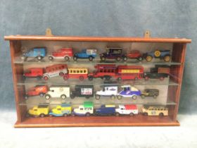 A collection of twenty-four model vintage vans, cars and buses, various makers including Matchbox,