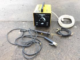 A Topeld 140 electric arc welder with cables, etc.