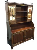 A Victorian mahogany bookcase cabinet, the galleried top above three open shelves flanked by