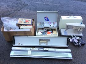 Miscellaneous sewing equipment - a cased Singer Stylist electric sewing machine, a Knitmaster