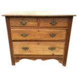 An Edwardian walnut chest of drawers, the rectangular moulded top above two short and two long