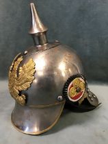 A reproduction German imperial steel cuirassier pickelhaube, with faux leather lining and brass