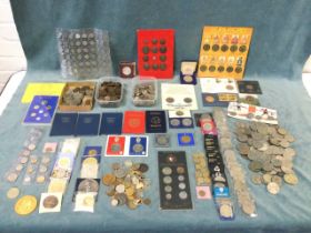 A large collection of British and foreign coins, medals and tokens including old pennies, half