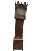 A C19th oak longcase clock case, the hood with broken swan-neck pediment, brass mounts and finials