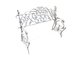 A 4ft Victorian cast iron garden bench, the back cast in the form of twisted vines with scrolled