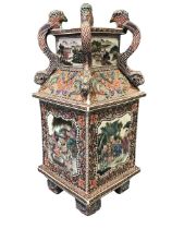 A Chinese square porcelain vase with four mythical beast handles to the corners, the neck painted