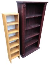 A faux rosewood bookcase, the rectangular top above five open shelves flanked by fluted pilasters