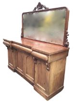 A Victorian mahogany mirror back sideboard, the rounded back with carved and pierced crest above
