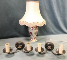 A ceramic tablelamp, the hexagonal baluster vase printed with sprays of roses, with octagonal