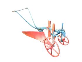 A Victorian wrought iron plough with spoked guide wheels ahead of shaped blade and flared driving