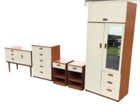 A 70s Schreiber teak effect bedroom suite with white laminate panels and moulded handles - a