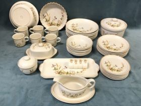 A Harvest pattern ceramic ovenproof dinner service, mugs, plates, butter dish, jam pot, quiche dish,