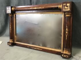 A nineteenth century rosewood overmantle mirror, the split turned columns on frame with gilded