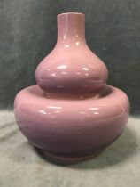 A Chinese purple glazed double gourd porcelain vase, with sunken waist and tapering neck, signed