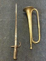 A brass military bugle by Boosey & Hawkes - London - 17in; and a British WW1 steel bayonet with
