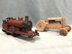 An antique German clockwork tinplate model 4-4-0 steam locomotive in LMS livery - 12.5in; and a wood