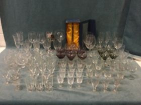 A quantity of wine gasses including two Caithness sets, flutes, some antique, sets, Edinburgh