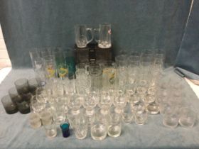Miscellaneous drinking glasses including beer pints, tankards, a set of star cut rummers, cordial,