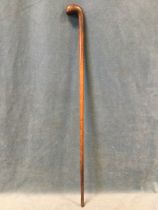 A Victorian golfers Sunday stick with club handle, the tapering shaft with brass ferrule. (33.5in)