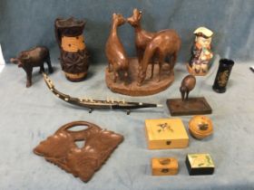 Miscellaneous collectors items including carved hardwood animals, a rustic treen jug, a Mauchline