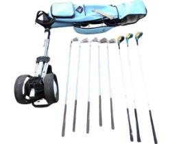 A Dunlop golf bag & trolley containing ladies clubs - John Letters Leading woods - nos 1, 4 & 7, and