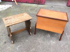 A 60s teak sewing box with rectangular tray top above twin compartments having concertina action,