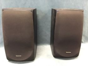 A pair of Technics 50W hi-fi speakers, each with three cones under cushion covers. (16.5in) (2)