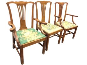 A set of three Chippendale style oak chairs - two carvers and a single, with scalloped backs above