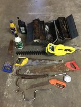 Miscellaneous tools - a Challenge electric hedge clipper, three saws, a grappling hook, a metal