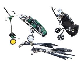 A King Cobra golf bag on a Masters trolley, containing sixteen clubs, by Donnay, Dunlop, Surpass,