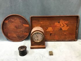 An Edwardian Winterhalder & Hofmeier arched oak cased mantel clock with copper dial, roman chapter