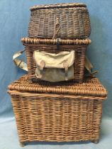 A cane fishing basket stool with canvas bag to front, having leather mounts; an antique cane fishing